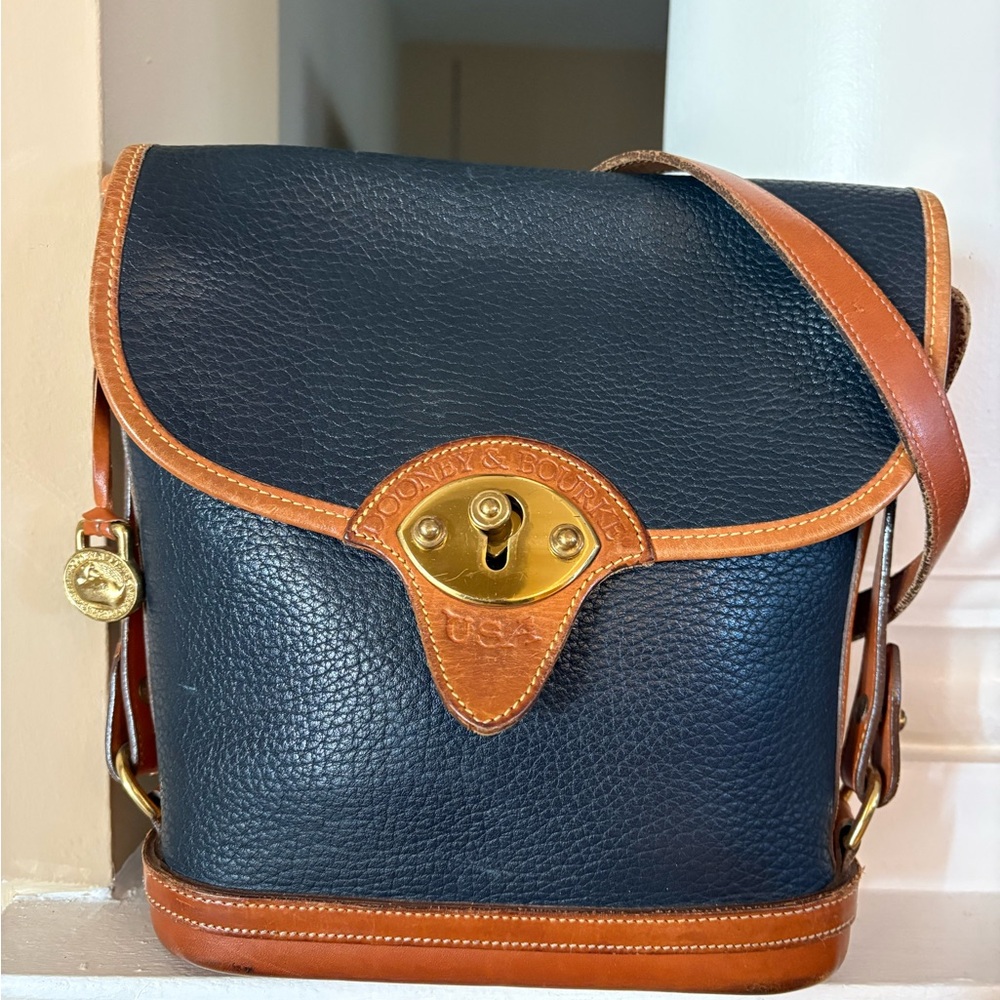 Dooney & Bourke Black Pebbled Leather Crossbody with Brown Trim
